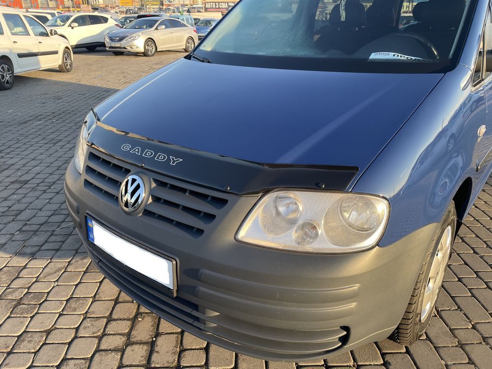 Дефлектор капота (мухобойка) Volkswagen Caddy 2004-2010 (VIP) 00-00000571 фото