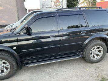 Дефлекторы окон (ветровики) Mitsubishi Pajero Sport 1996-2009 (HIC) 00-00003690 фото