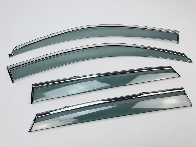 Д/в Hyundai Tucson I 2004-2010 з хром полоскою (Defl) 00-00014129 фото