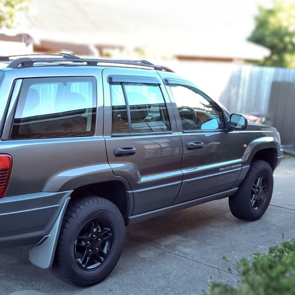 Дефлектори вікон (вітровики) Jeep Grand Cherokee 1999-2005 (HiC) 00-00007663 фото