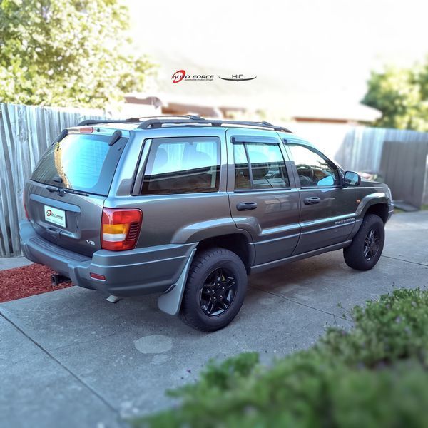Дефлектори вікон (вітровики) Jeep Grand Cherokee 1999-2005 (HiC) 00-00007663 фото