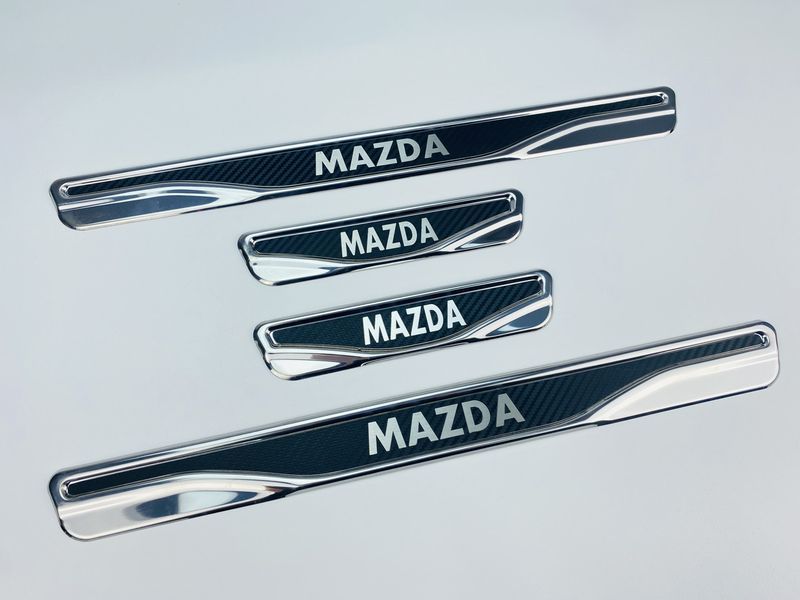 Накладки на пороги Mazda 4шт (Y-2 хром-карбон) (TAN24) 00-00011766 фото
